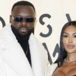 Gims s’affiche avec sa nouvelle compagne au défilé Louis Vuitton [Vidéo]